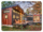 photo of tiny home with patio, outside sitting place, autumn leaves on the ground